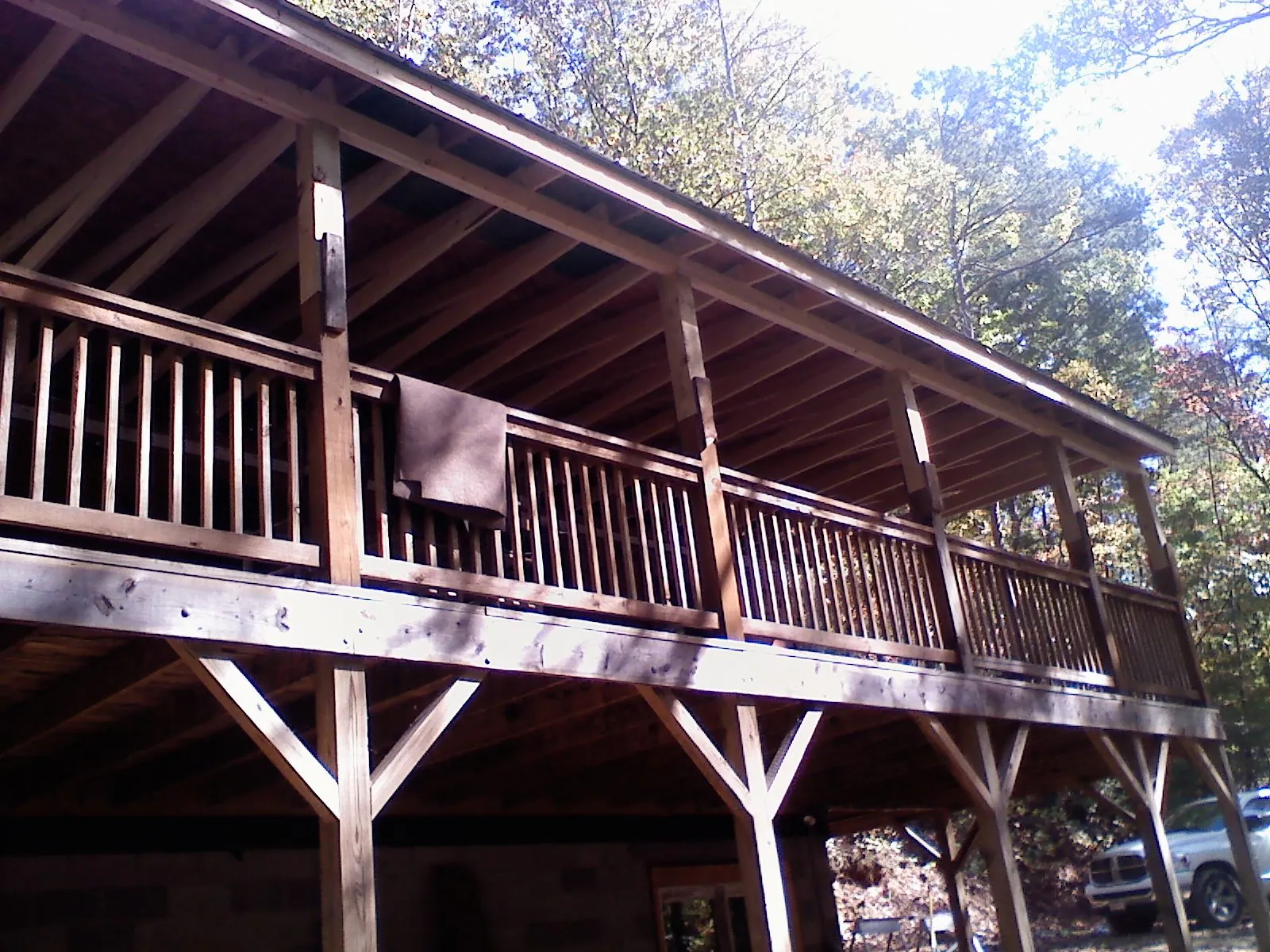 Timber framing under a new elevated porch and deck — Roof Leak Repair in Syria by Roofing Brothers